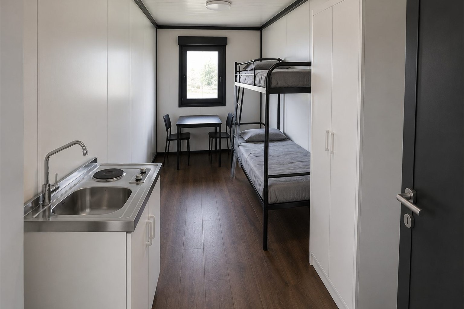 Wohncontainer innen: Wohnraum mit Fenster und Heizkonvektor